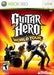 Cover of Activision's "Guitar Hero World Tour" Xbox 360 game, highlighting the complete band experience. The cover image displays a stylized black silhouette of a band with guitarists, a drummer, and a vocalist set against a vibrant fiery orange background. The bold logo of the game is prominently featured at the center.