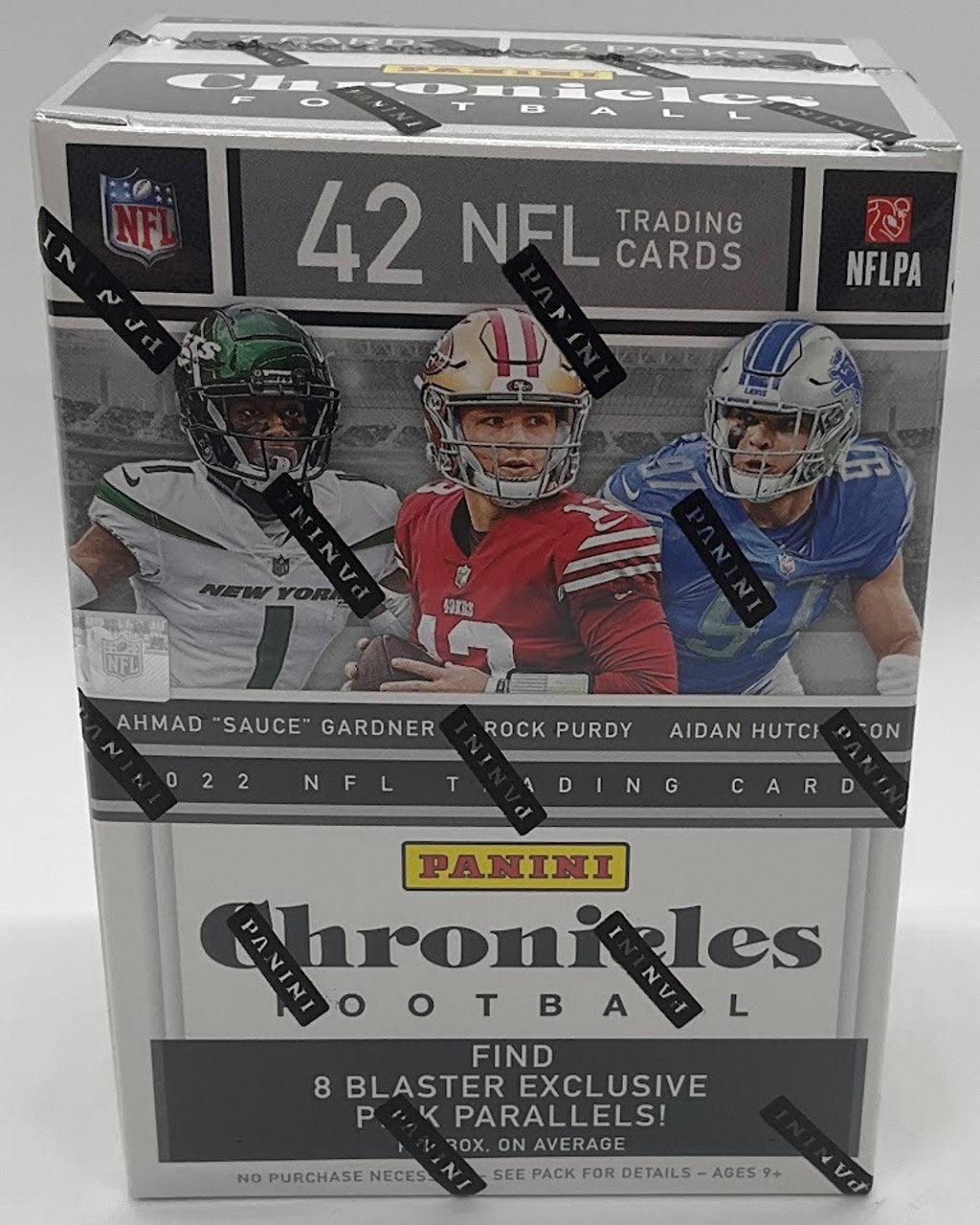 A box of 2022 Panini Chronicles Football Blaster trading cards from Panini showcases images of three NFL stars—Ahmad 