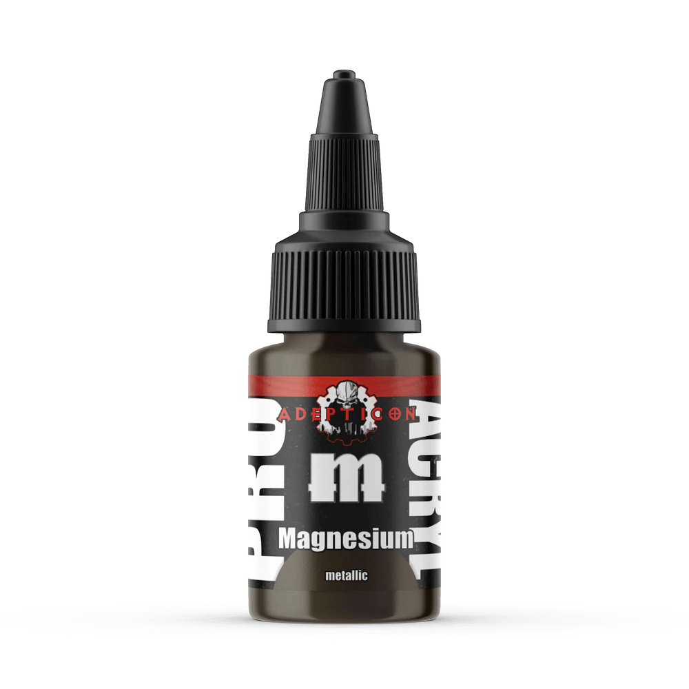 A bottle of Monument Hobbies' S42 - Megnesium with a metallic label featuring bold black and white text, high-density pigment, and includes a black screw cap with a pointed nozzle for easy application.