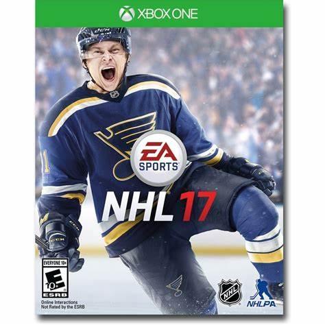 The NHL 17 cover for Xbox One by Everything Games features a hockey player in blue and gold celebrating, highlighting the Draft Champions mode. The "EA Sports" logo, "NHL 17" title, Teen ESRB rating, NHL and NHLPA logos are set against a blurred ice arena backdrop.