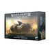 Image shows the box of a Games Workshop model kit named "SOLAR AUXILIA: BASILISK/MEDUSA." The front features a formidable Solar Auxilia artillery tank amidst a smoky battlefield. The sides have Games Workshop branding details and a schematic image of the siege gun-equipped vehicle.