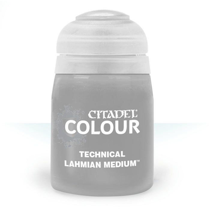 The image shows a bottle of Citadel Technical - Lahmian Medium, essential for miniatures. The cylindrical bottle with a white flip-top lid is semi-transparent gray with white text on the front that reads, "CITADEL TECHNICAL - LAHMIAN MEDIUM™," ideal for creating special effects with technical paints.