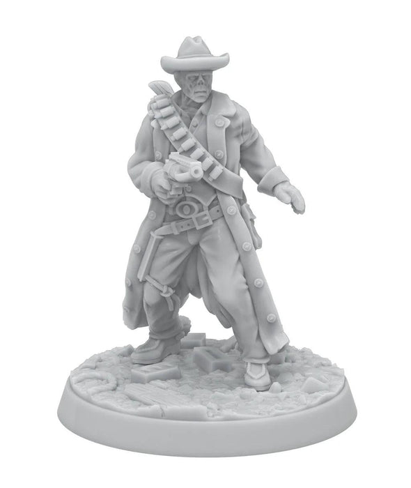 A highly detailed miniature figurine from the Fallout: Miniatures - Hollywood Heroes (Amazon TV Show Tie-In) by Modiphius, showcasing a rugged cowboy with a hat, long coat, and bandolier. He stands on a textured base with scattered debris, holding a weapon and additional gear on his back, embodying a stoic, ready-for-action pose.