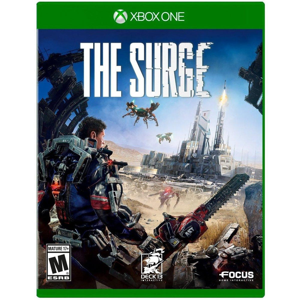 Cover art for the Xbox One game "The Surge" by Focus Home Interactive. It shows a protagonist in an exo-suit with a weapon, facing a futuristic industrial facility under attack. Two flying drones are visible in the background. Featuring an innovative limb-targeting system, this action-RPG's logo is at the top, with ratings and developer logos at the bottom.