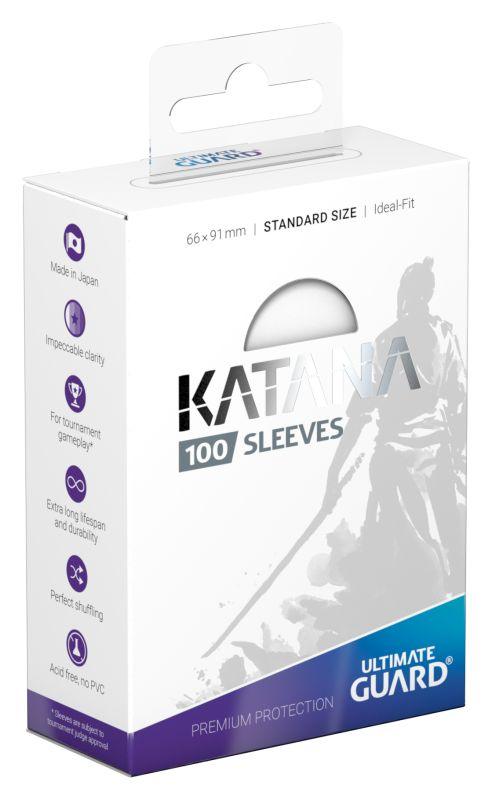 A white package of Ultimate Guard Sleeves Katana White 100-Count. The front of the box features a silhouette of a warrior holding a katana. The box indicates it contains 100 durable sleeves, made in Japan with impeccable clarity, tournament quality, and PVC-free construction for elite tournament gameplay.