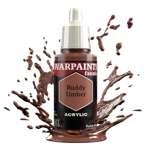 A bottle of Everything Games Warpaints Fanatic: Ruddy Umber acrylic paint. The bottle has a white cap and a black label with a hexagon featuring the color name. Brown paint is splashing around, creating an artistic effect.
