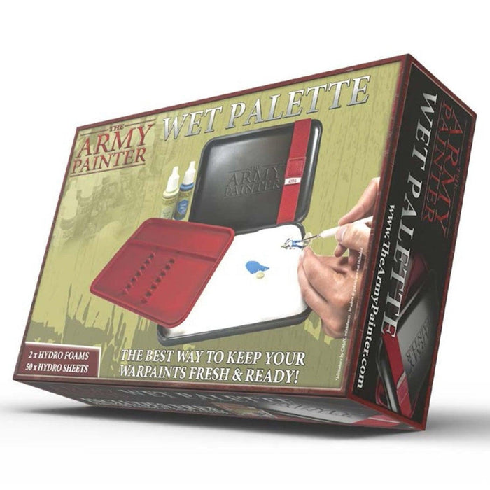 The image showcases the packaging of the "Army Painter Wet Palette" by Army Painter. The design features the product name at the top, an image of a hand using a brush on the wet palette, and details like "2 x Hydro Foams" and "50 x Hydro Sheets." The tagline promises: "The Best Way to Keep Your Warpaints Fresh & Ready!