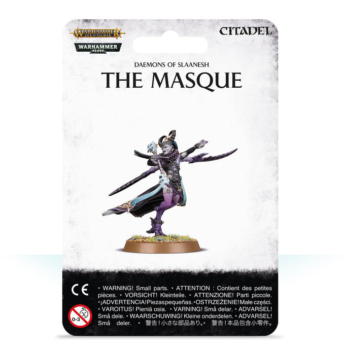 The image shows a packaged miniature figure from the game Warhammer, marked as "HEDONITES OF SLAANESH: THE MASQUE" from the Daemons of Slaanesh collection by Games Workshop. This combat-focused character features a detailed figure in a dynamic pose, with multiple outstretched arms and a mix of purple, white, and black colors. Safety warnings are visible at the bottom.