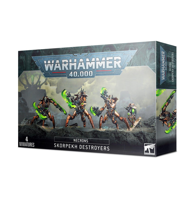 A box of Games Workshop NECRONS: SKORPEKH DESTROYERS miniatures labeled "Necrons Skorpekh Destroyers." The cover art shows four futuristic robotic figures, known as close-combat killers, holding green energy weapons in dynamic poses. The box is predominantly black with blue-green hues and the Warhammer 40,000 logo prominently displayed at the top.