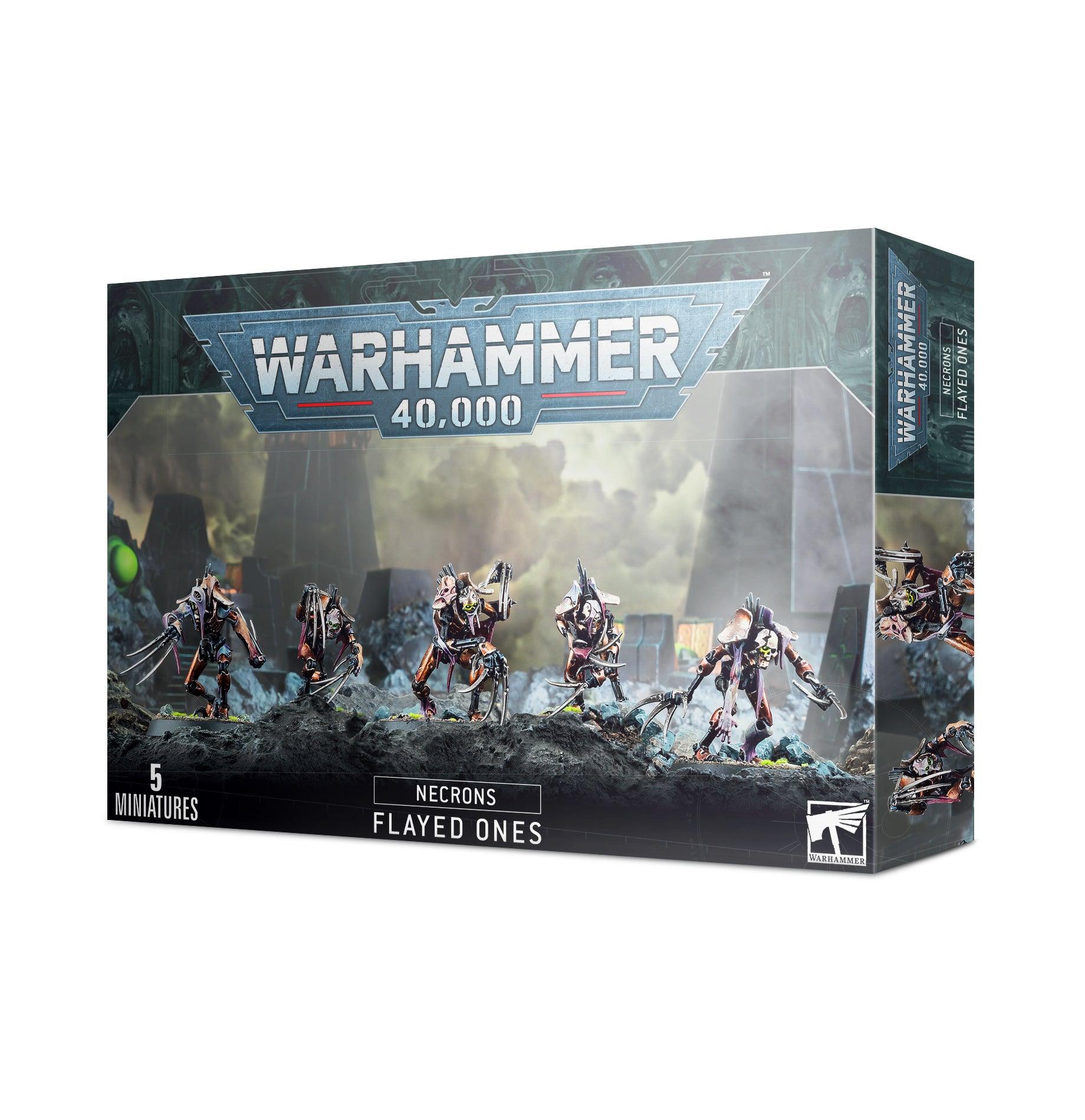 The box of NECRONS: FLAYED ONES features five Necron Flayed Ones figures set against a futuristic battlefield backdrop. The top section prominently displays the 