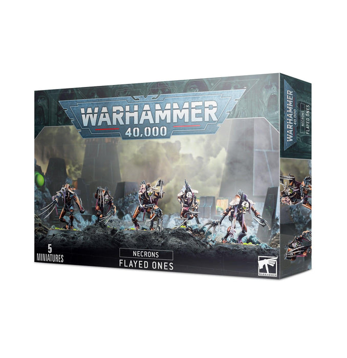 The box of NECRONS: FLAYED ONES features five Necron Flayed Ones figures set against a futuristic battlefield backdrop. The top section prominently displays the "Warhammer 40,000" logo, while the bottom section reads "NECRONS: FLAYED ONES" with "5 Miniatures" in the lower left corner.