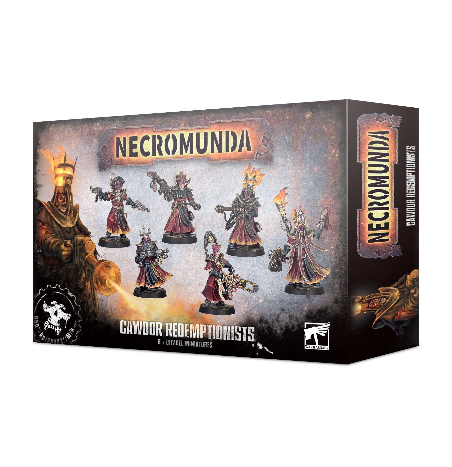 The box for NECROMUNDA: CAWDOR REDEMPTIONISTS by Games Workshop showcases six armored figures in red robes wielding weapons, set against a fiery industrial backdrop with the game's logo. A skull logo appears at the bottom left, and a small manufacturer's logo is on the bottom right.