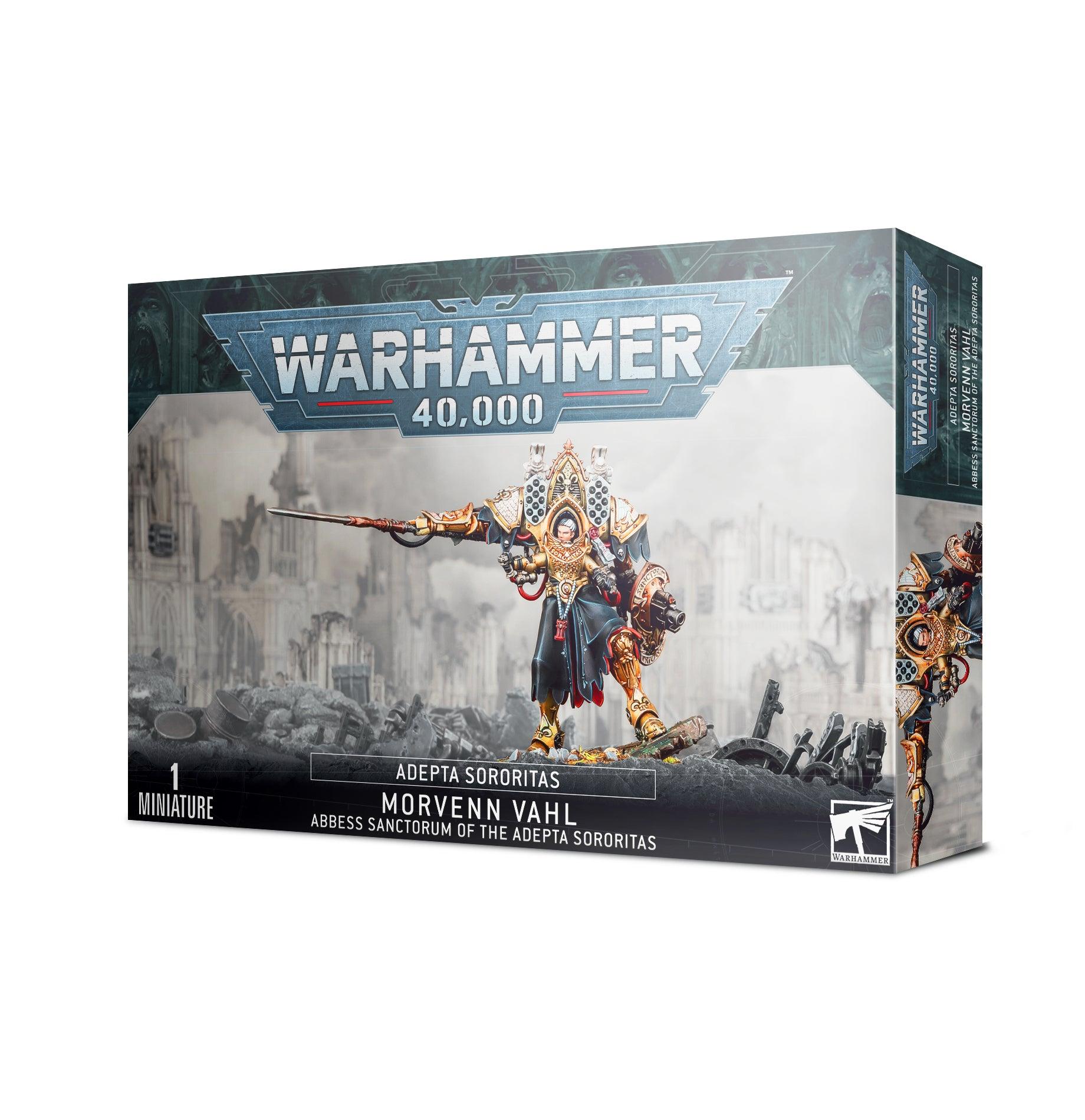 Box featuring the ADEPTA SORORITAS: MORVENN VAHL ABBESS SANCTORUM miniature by Games Workshop, depicting Morvenn Vahl in a Paragon Warsuit. Intricate artwork shows her with a spear against a futuristic cityscape. Title and branding are prominently displayed on the packaging.