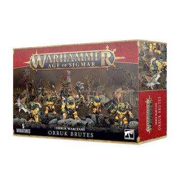 A boxed set of Games Workshop miniatures titled "ORRUK WARCLANS: ORRUK BRUTES" features artwork of five detailed, multi-part plastic kit orc-like miniatures wielding various weapons against a dark, battle-scarred background. The packaging prominently highlights "5 Miniatures" at the bottom left corner.