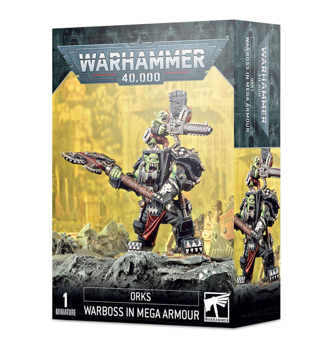 Box cover for a Games Workshop miniature set titled "ORKS: ORK WARBOSS IN MEGA ARMOUR." Image depicts an Ork Warboss in heavy, elaborate powered armor wielding a large weapon. The background features a dystopian, war-torn landscape. The box indicates it includes one miniature.