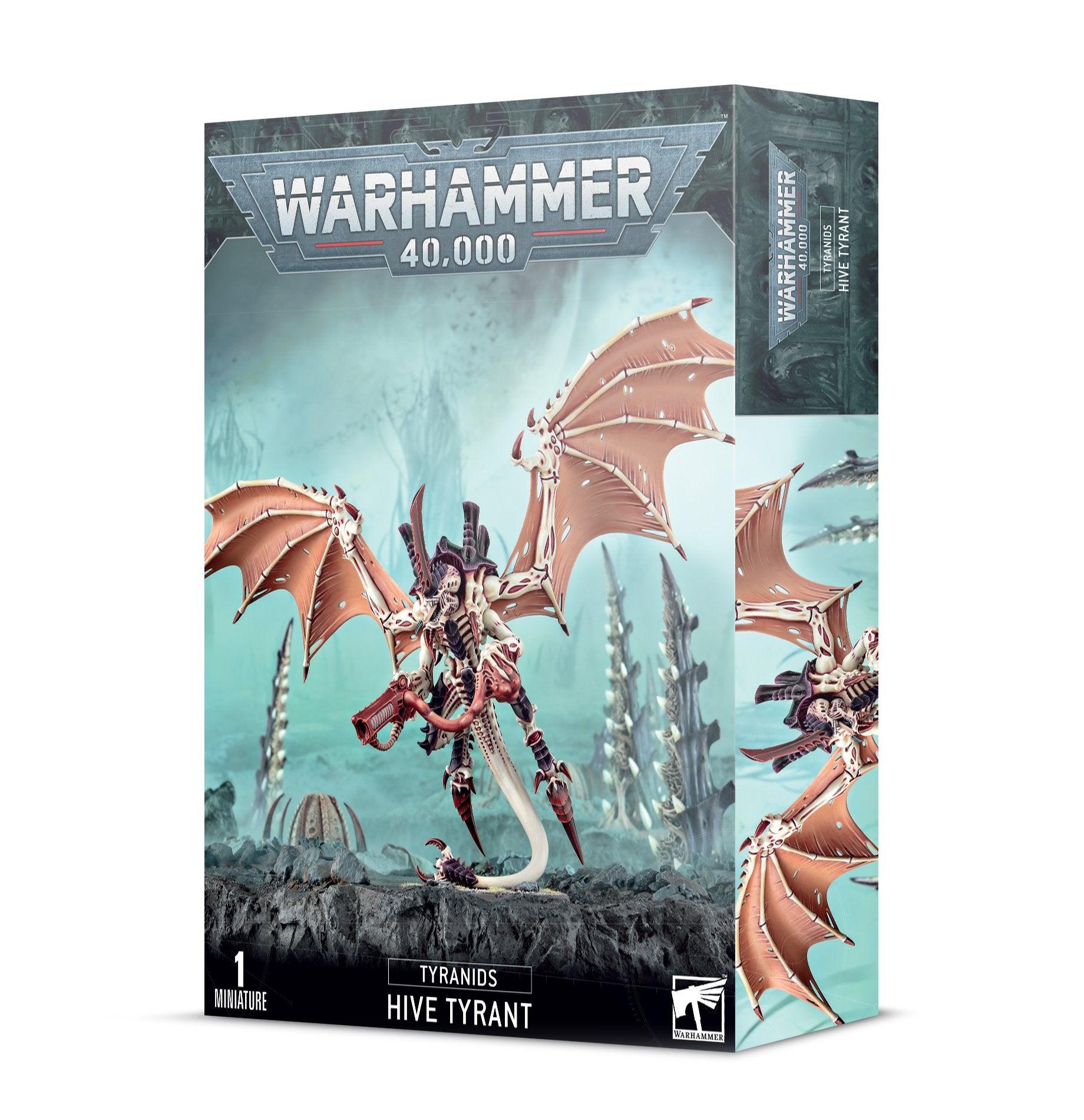 A box for a TYRANIDS: HIVE TYRANT miniature. The box art depicts a detailed, menacing Tyranid creature with large, membranous wings, multiple limbs, and organic armor and weapons, standing in an alien environment. The packaging is labeled with 