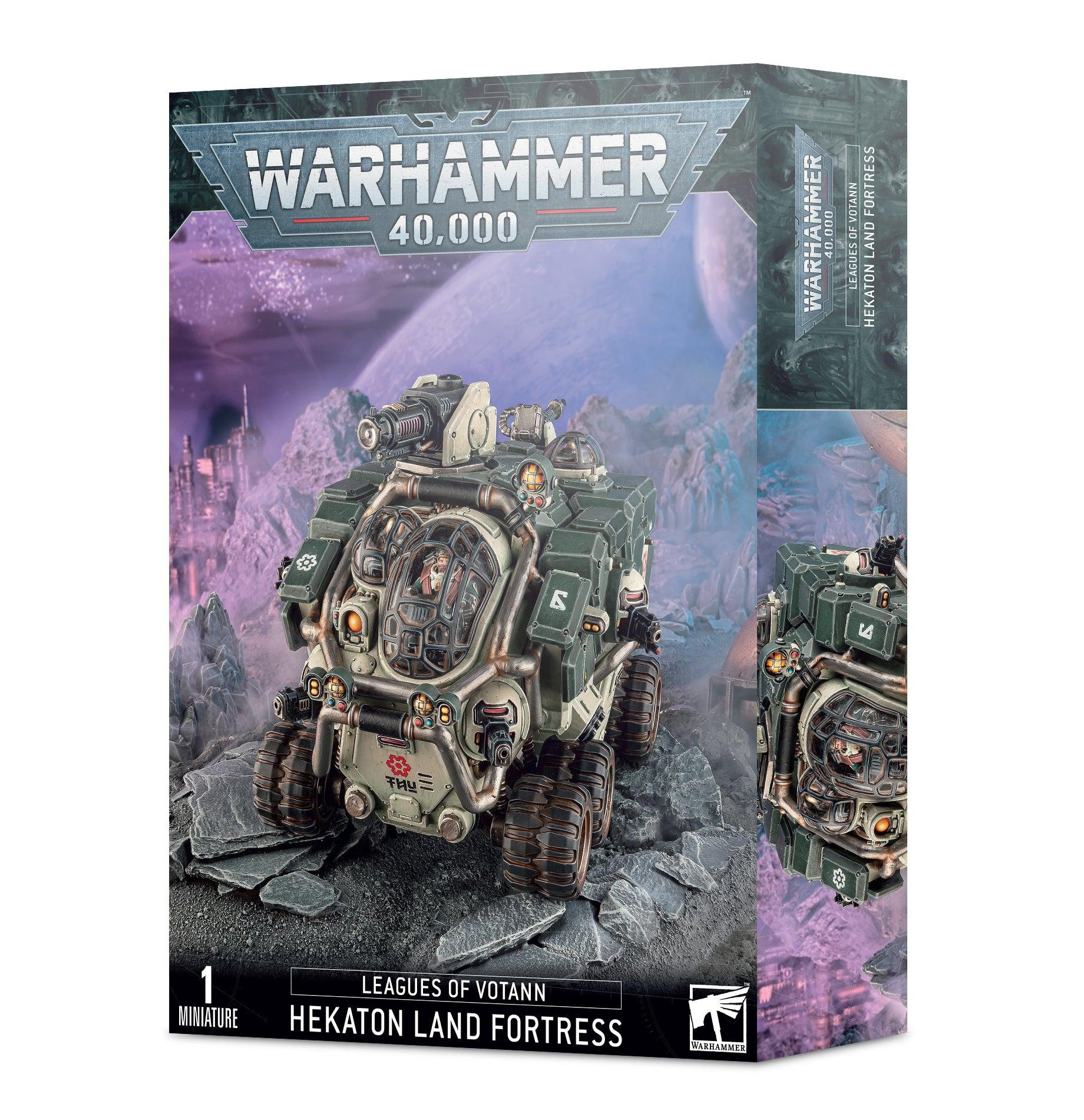 The Warhammer 40,000 Leagues of Votann Hekaton Land Fortress model kit box features a fully assembled and painted armored transport, set against a purple alien landscape. The vehicle stands prominently with the text 