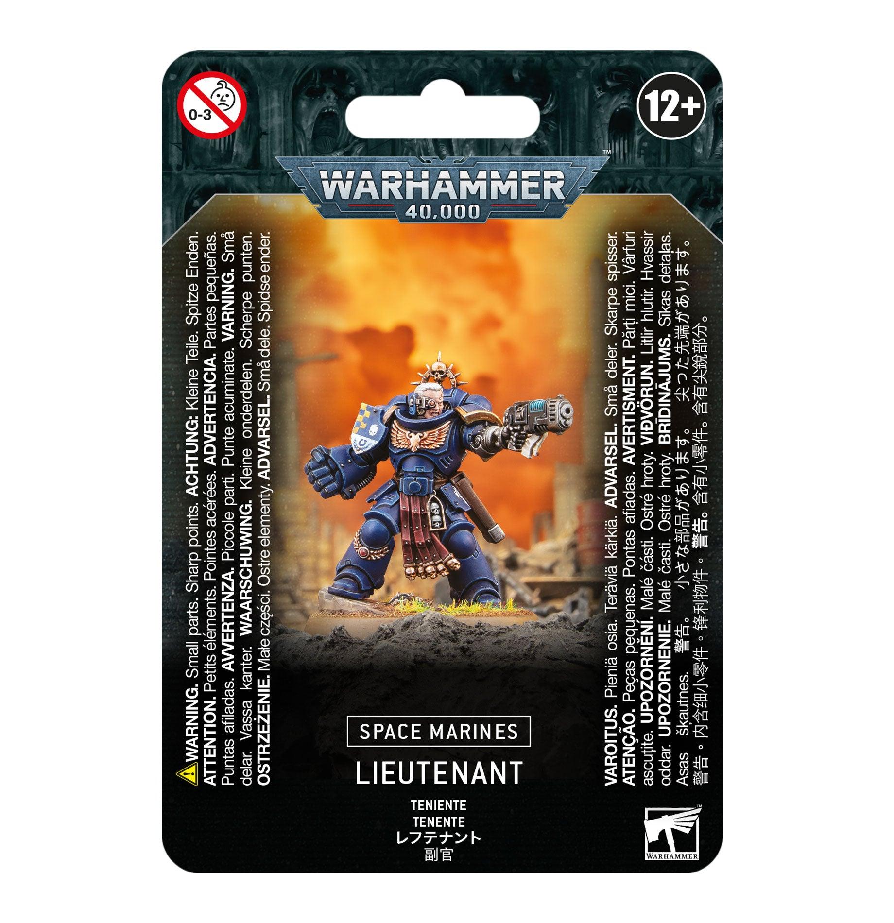 Product packaging for a SPACE MARINES: LIEUTENANT model kit by Games Workshop. The front features an armored figure engaged in battle with multiple weapon options, standing on a rocky base surrounded by flames. The image is bordered by various warnings, age restrictions (12+), and multilingual text. At the top, the Warhammer 40,000 logo is prominently displayed.