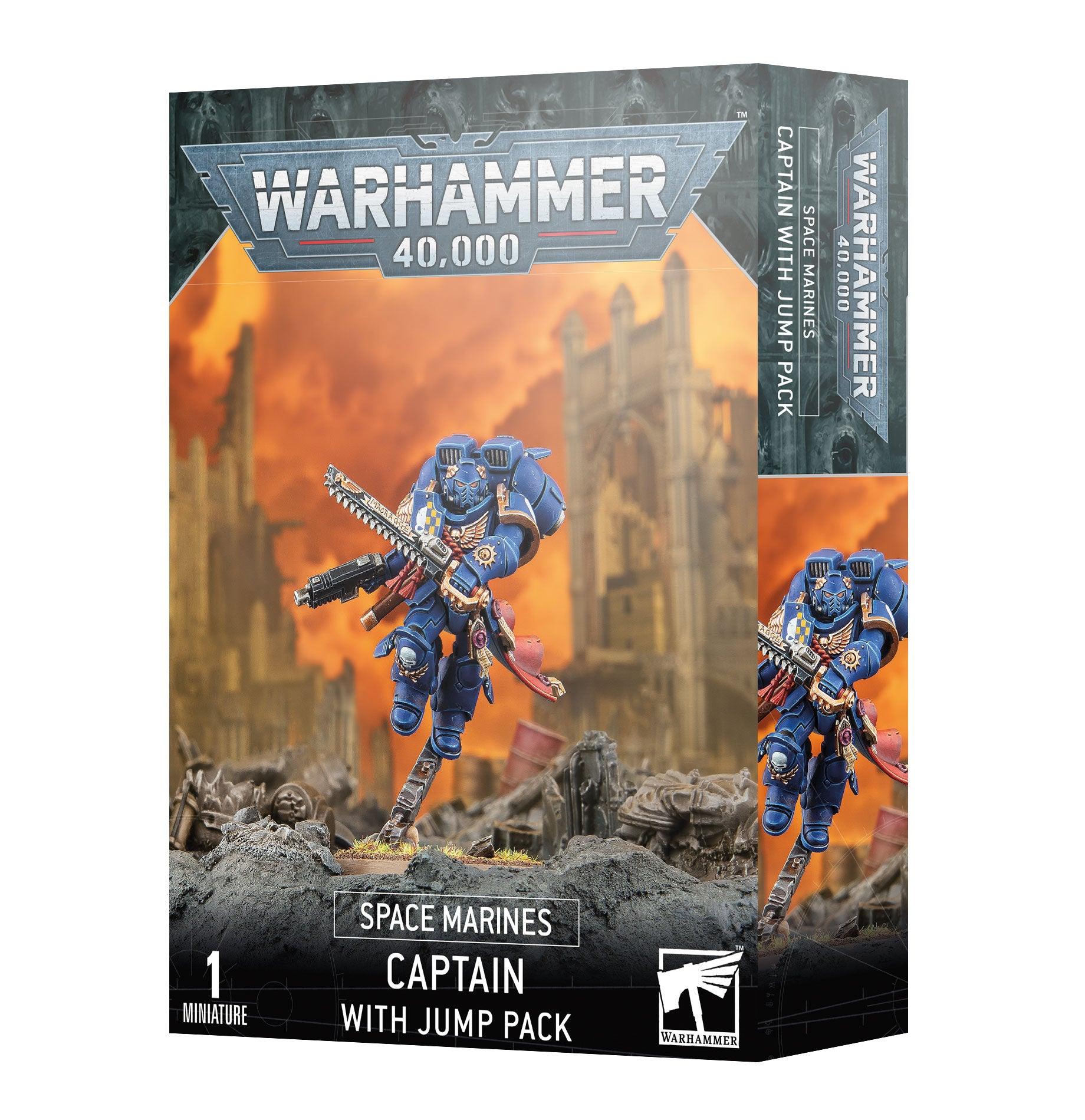 The image shows the packaging for a Games Workshop miniature, featuring artwork of an Adeptus Astartes Space Marine Captain with a jump pack. Armed with a sword and pistol, he leaps over a rocky battlefield. The box includes text: 