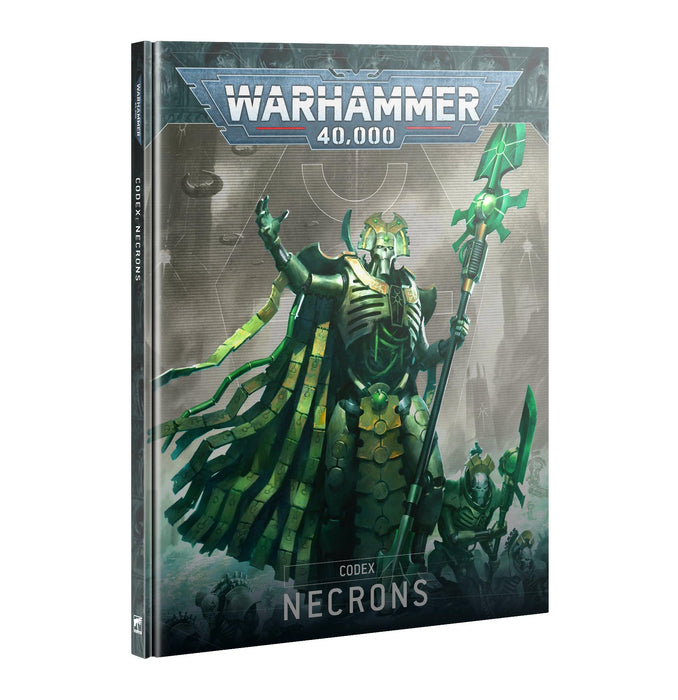 A book cover titled "CODEX: NECRONS (ENG)" by Games Workshop. The artwork depicts a powerful, green-glowing robotic figure made of living metal, holding a staff with an ankh-like symbol, flanked by other alien androids. The background shows a futuristic, mechanical environment with a predominantly green and metallic color scheme.