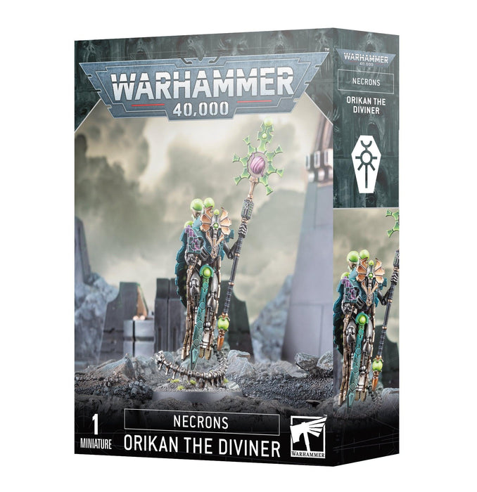 The image showcases the box art for a Games Workshop miniature featuring "NECRONS: ORIKAN THE DIVINER," a formidable Necron Cryptek. The illustration depicts the armored Chronomancer holding a glowing staff, surrounded by an alien-like landscape. The text reads: "Games Workshop NECRONS: ORIKAN THE DIVINER".