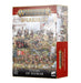 Box of "SPEARHEAD: CITIES OF SIGMAR" Freeguild miniatures set by Games Workshop. The front displays various painted warrior miniatures in a battle scene. The background has a detailed fortress. The set includes 17 Citadel miniatures, as indicated at the bottom left of the box.