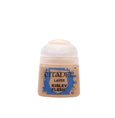 The Citadel Layer - Kislev Flesh paint is ideal for edge highlighting miniatures. It comes in a small jar with a clear lid, featuring beige paint and a label with blue splatters on a light grey background.