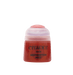 The image shows a bottle of Citadel Base - Mephiston Red by Citadel. The bottle is cylindrical with a red base and a transparent, slightly frosted lid. The text on the bottle is black, and above the label, there is a small raised button on the lid for easy opening—perfect for painting Citadel miniatures.