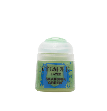 The Citadel Layer - Skarsnik Green paint, by Citadel, is ideal for miniature edge highlighting. It comes in a light green container with a transparent lid and features black text on a blue background with decorative paint splashes.