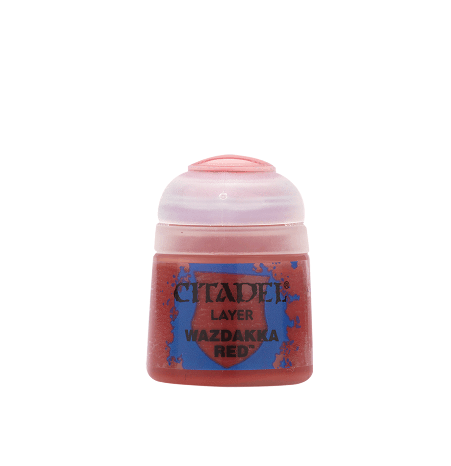 The Citadel Layer - Wazdakka Red paint is ideal for miniatures, featuring a translucent pink cap and red body with a blue label displaying the brand and color name. Perfect for edge highlighting, it's set against a plain light blue background.