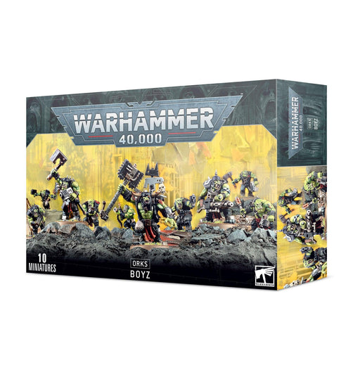 A box of ORKS: BOYZ (2021) miniatures by Games Workshop. The box features the Warhammer 40,000 logo at the top with an image below showing ten Ork miniatures in dynamic, battle-ready poses led by a formidable Boss Nob. The background depicts an industrial, war-torn environment. The text "10 miniatures" and "ORKS: BOYZ (2021)" is displayed
