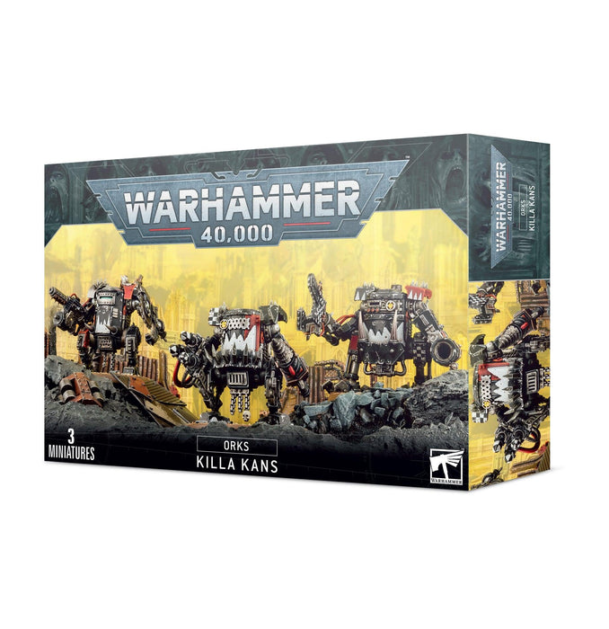 The image shows the packaging of a Games Workshop ORKS: KILLA KANS miniature set. The box art features three multi-part plastic Ork Killa Kans, which are mechanical, walker-like war machines. The background is a war-torn landscape. The front of the box displays the Warhammer 40,000 logo and indicates there are 3 miniatures included.