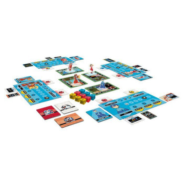 A tabletop setup features the colorful Megaman Adventures by Kessler Corporation, displaying player areas with blue stat cards, tokens, and dice. 3D character pieces stand ready to battle Robot Masters on a white background, with additional cards scattered around.