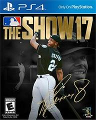 The cover of "MLB The Show 17" by Everything Games for PlayStation 4 features a player in a black uniform (#24) batting, with his face in the background. It has a gold signature and MLB logo and is rated "E" for everyone.