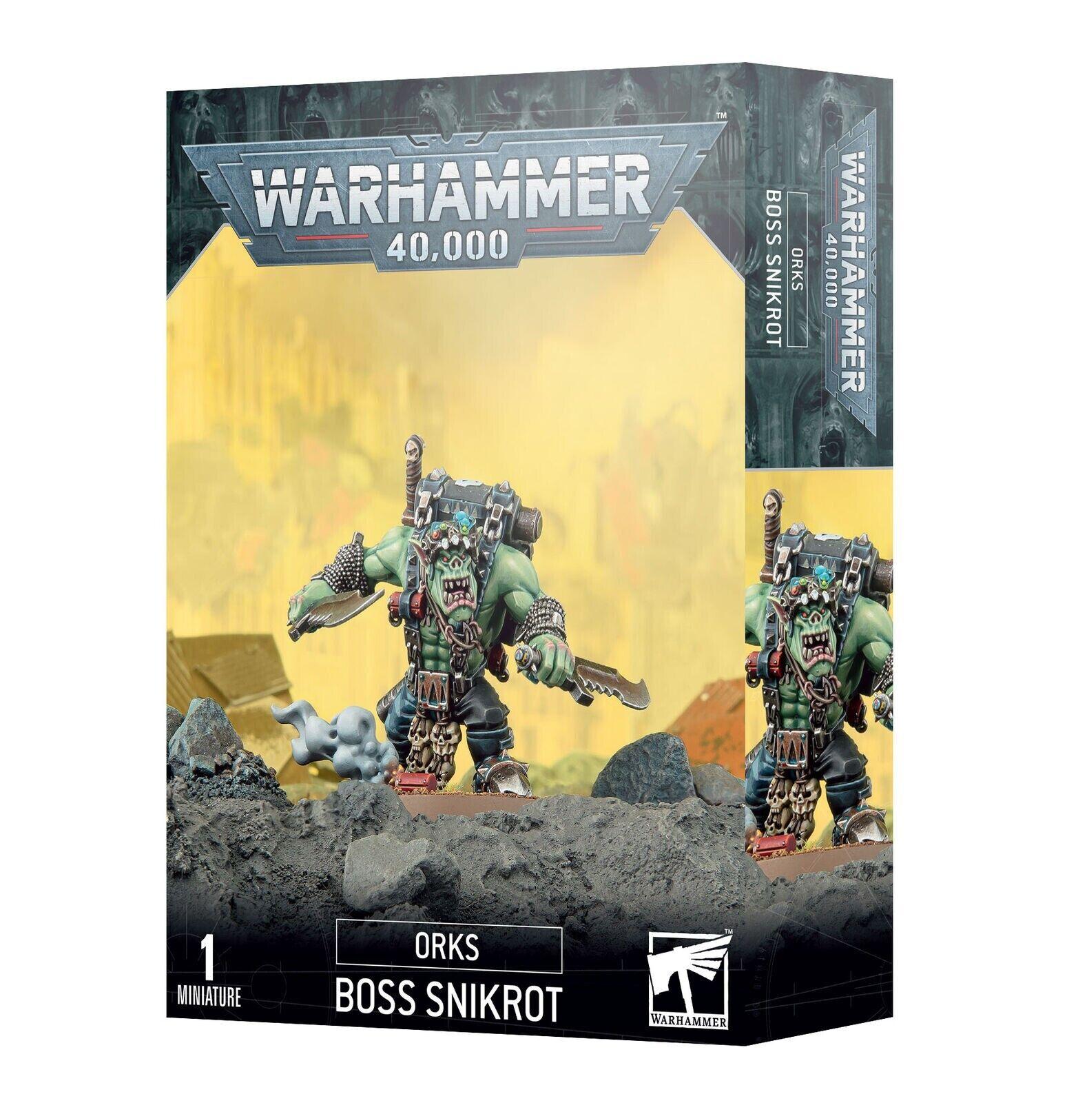 Box of ORKS: BOSS SNIKROT by Games Workshop, featuring Ork Kommando leader Boss Snikrot. The box art shows a detailed miniature figure of an Ork in combat gear, specializing in guerilla warfare, holding blades with a rugged terrain backdrop. The box includes branding with text 