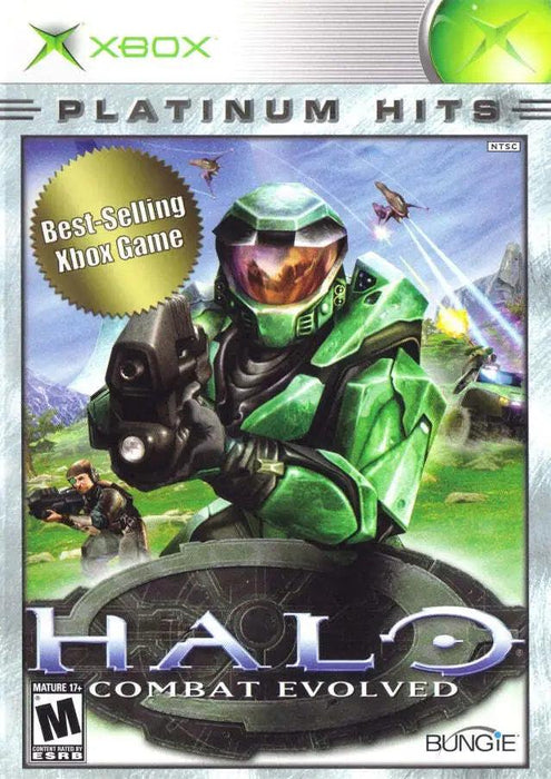 Cover of the "Halo: Combat Evolved (Platinum Hits Edition)" Xbox game from the Everything Games series. Features Master Chief in green armor holding a gun, with a futuristic battle scene against the Covenant in the background, including aircrafts and explosions. Text highlights "Best-Selling Xbox Game." Rated Mature 17+ by ESRB. Bungie logo at bottom.