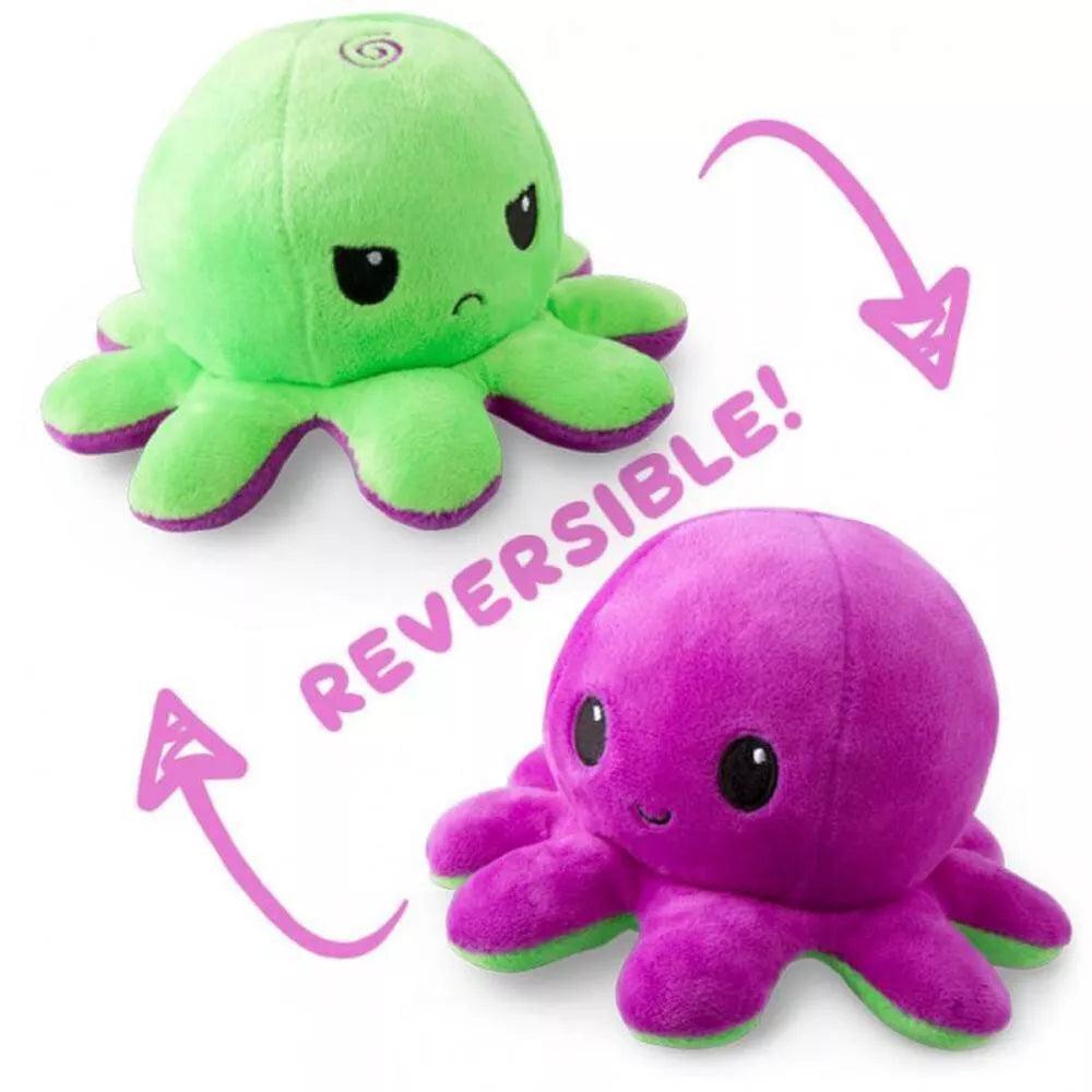 Two TeeTurtle Reversible Red and Fire Eyes Octopus Plushies are shown. One side is green with an angry expression, while the other side is purple with a happy expression. Arrows and the text 