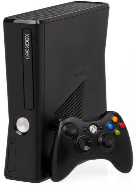 An Xbox 360 Slim console in black from Microsoft is standing upright, accompanied by a matching wireless controller. The console boasts a sleek design with a disc drive button, and the controller features colorful A, B, X, Y buttons along with dual analog sticks. The Xbox 360 logo is prominently displayed on the console.