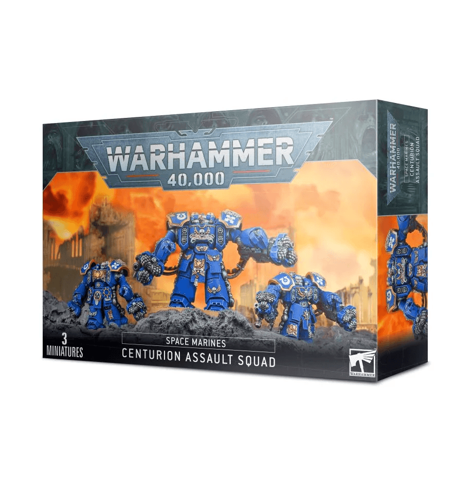 Package of Games Workshop's SPACE MARINES: CENTURION ASSAULT SQUAD miniatures, featuring three blue-painted Space Marine Centurion Assault Squad figures equipped with heavy duty siege drills. The packaging displays the Warhammer 40,000 logo at the top against a fiery battlefield backdrop. Text at the bottom reads 