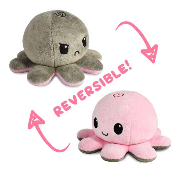 Two plush octopus toys are shown. The top octopus is gray with an angry face, while the bottom one is pink with a happy face. Pink arrows and the word 