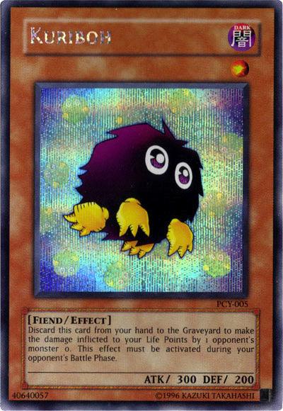 Image of a "Kuriboh [PCY-005] Super Rare" Yu-Gi-Oh! trading card. Kuriboh, an adorable Effect Monster, is depicted as a small, round, furry creature with large eyes and yellow claws. The background is holographic. It has 300 attack points and 200 defense points. Its effect allows you to discard it to reduce battle damage to zero for one turn in Power of