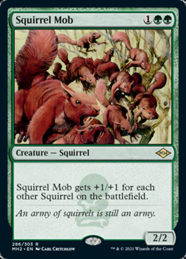 Card image titled "Squirrel Mob" from Magic: The Gathering's Modern Horizons 2 features an illustration of expressive, aggressive red squirrels. The green mana creature card has a "Squirrel" type with power and toughness values of 2/2.