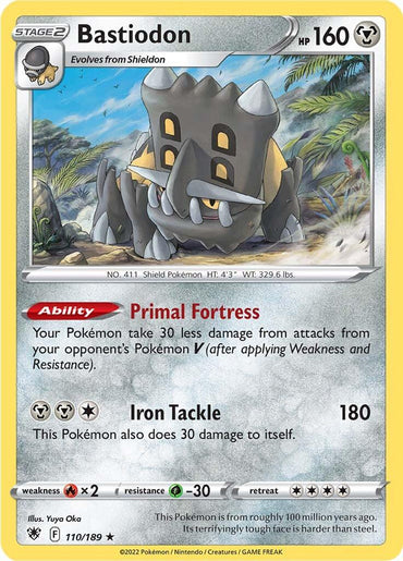 A Holo Rare Bastiodon trading card (110/189) from the Pokémon Sword & Shield: Astral Radiance set, featuring a 160 HP rock/steel-type Pokémon with a shield-like face. The card showcases Bastiodon's ability "Primal Fortress" and includes the move "Iron Tackle," which inflicts 180 damage while also causing harm to Bastiodon.