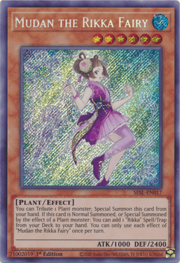 A "Yu-Gi-Oh!" Secret Rare trading card titled "Mudan the Rikka Fairy [SESL-EN017]" depicts an Effect Monster with a fairy-like character. The character has short hair and is dressed in a purple and pink outfit adorned with flowers, surrounded by sparkles. The card details displayed at the bottom are ATK 1000/DEF 2400.