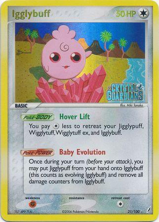 A rare Pokémon card featuring Igglybuff, a pink, round Pokémon with a swirl on its forehead and large, blue eyes. The colorless card has 50 HP and two abilities: Hover Lift and Baby Evolution. The background shows a tropical setting with palm trees. This Pokémon Igglybuff (21/100) (Stamped) [EX: Crystal Guardians] card is number 21/100.