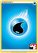 A Common Water Energy [Prize Pack Series One] trading card from Pokémon featuring a blue and black droplet symbol, indicating Water Energy. The background is a gradient blue with light rays emanating from the droplet. The card is bordered in yellow, with a small icon of a hand holding a Poké Ball in the bottom right corner.