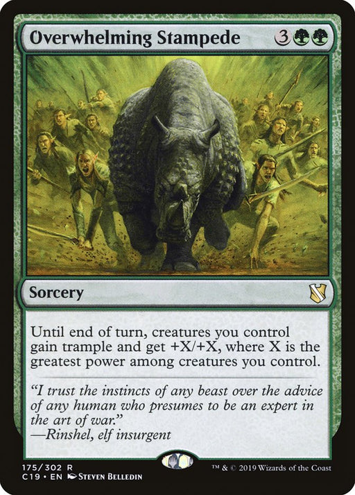 The image shows a Magic: The Gathering card named "Overwhelming Stampede [Commander 2019]." The card art by Steven Belledin depicts a herd of creatures you control, led by a large green beast, charging forward with people running in panic. This Sorcery from Commander 2019 has a green border and is labeled as rare.