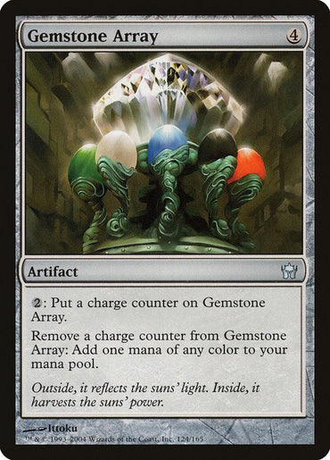 A "Magic: The Gathering" card titled "Gemstone Array [Fifth Dawn]." This uncommon artifact has a casting cost of 4 colorless mana. The artwork depicts a large gem held by green serpentine figures. The text box includes abilities for adding charge counters and converting them to mana, accompanied by flavor text.