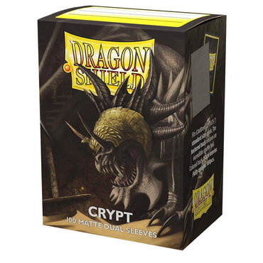 Arcane Tinmen's Dragon Shield: Standard 100ct Sleeves - Crypt (Dual Matte) features a monstrous dragon with leathery wings, sharp teeth, and a horned, armored head against a dark backdrop. The box contains 100 opaque sleeves with black interiors.