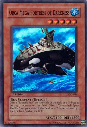 A Yu-Gi-Oh! trading card titled "Orca Mega-Fortress of Darkness [IOC-084] Super Rare." This Super Rare Effect Monster from the Invasion of Chaos set showcases a massive mechanical orca equipped with missiles and cannons. The Sea Serpent/Effect type card boasts 2100 ATK, 1200 DEF, and unique effects text.